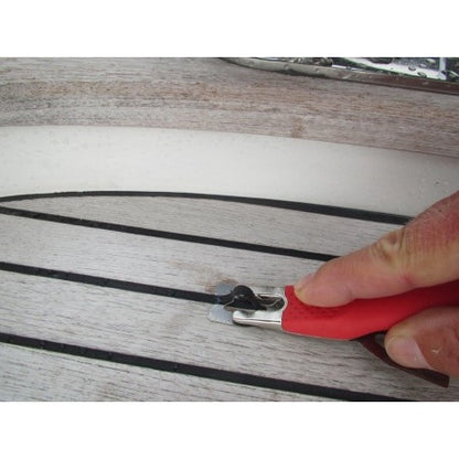 Outil trimmer Mozart joints SikaFlex finition teck marine
